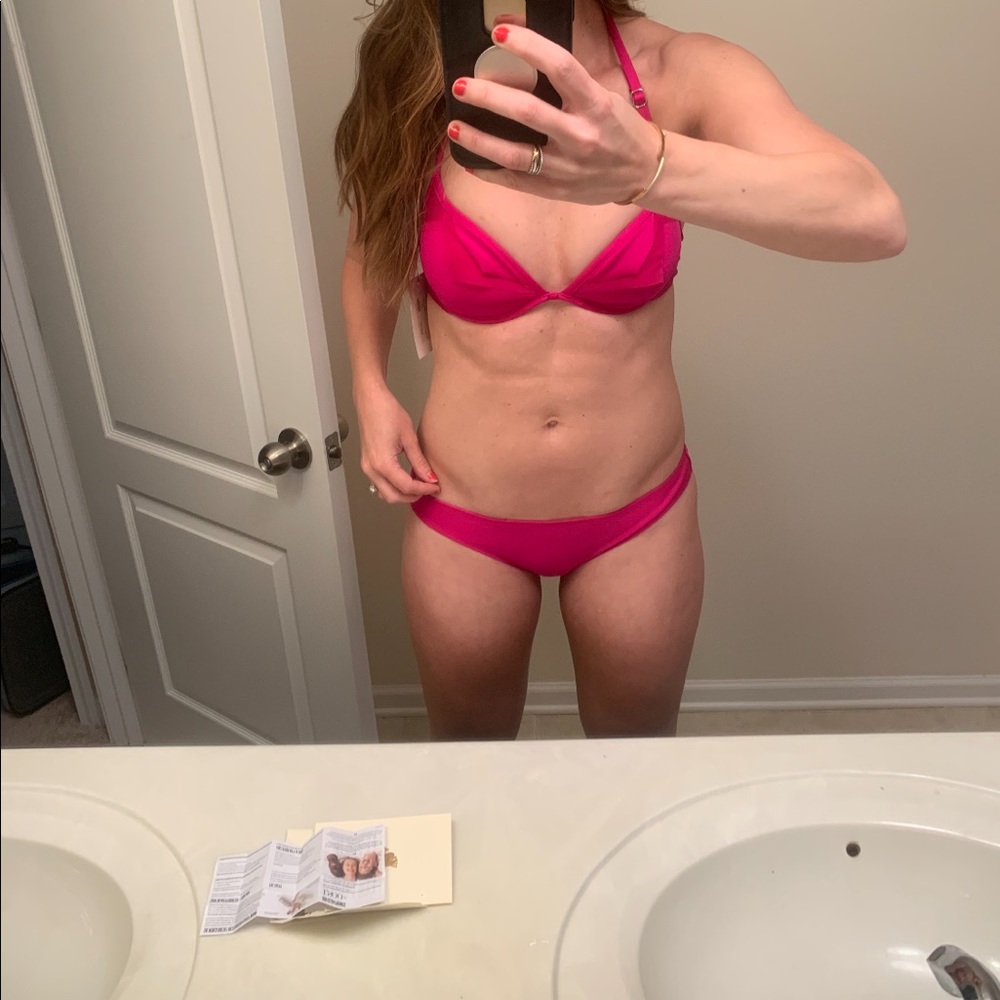 Hot pink Kandice Pelletier competition swimsuit